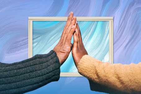 Therapeutic touch. A photograph of a hand from each of two people held up to each other. The person on the left is wearing a dark blue-grey jersey, and the one on the right is wearing a mustard yellow one. In the background is a marbled purple, blue and whte background with a white frame around part of it.